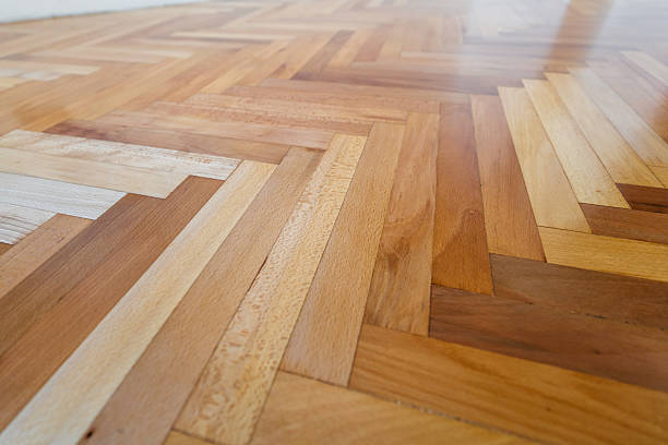 Varnished parquet floor in an empty apartment